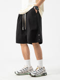 Casual Multi-Pocket Drawstring Cargo Shorts